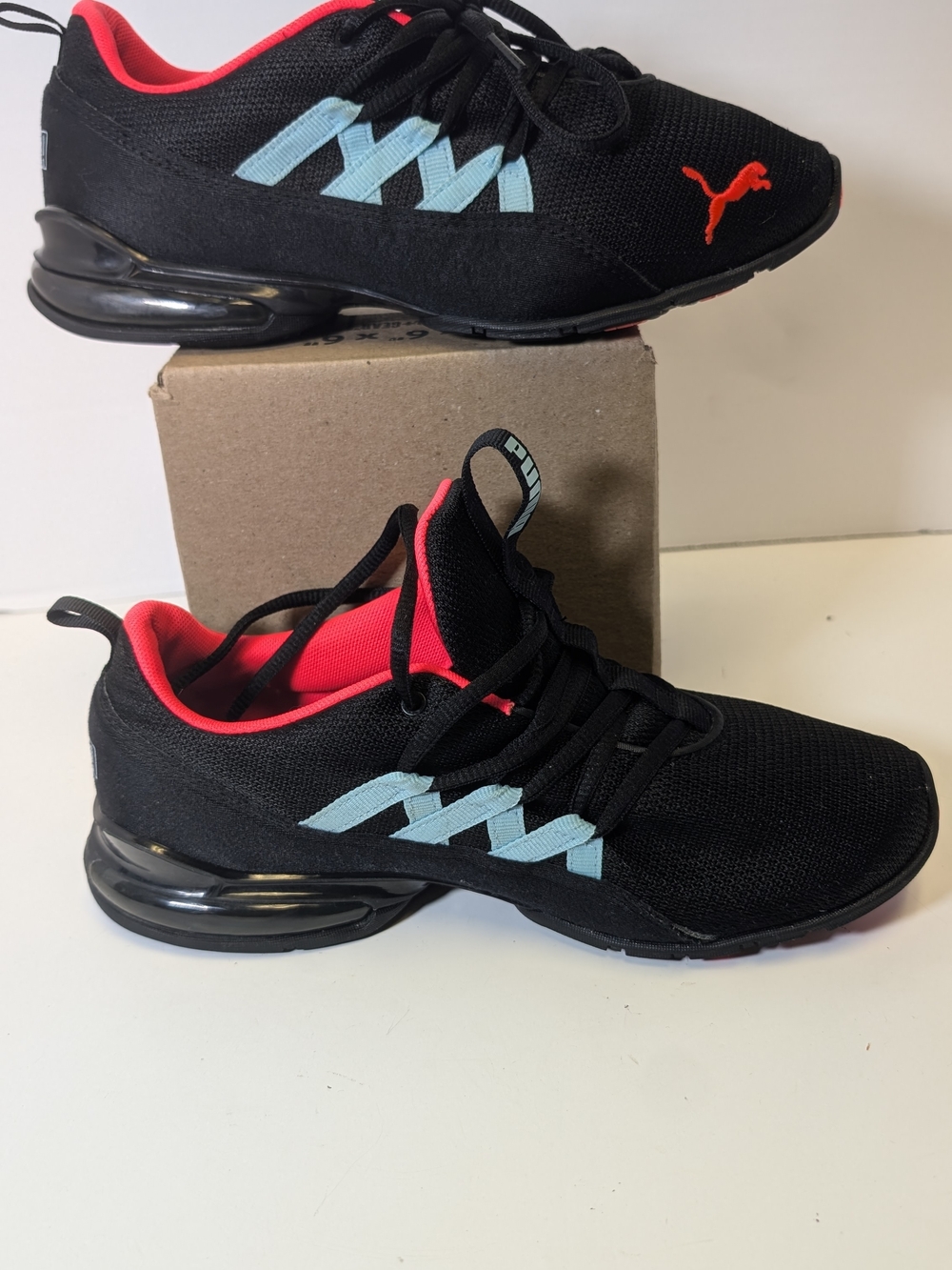 Puma Black Sneakers with Coral Lining and Light Blue Accents
